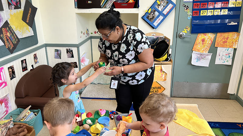 A Support Teacher works with children at the Erwin Child & Family Center