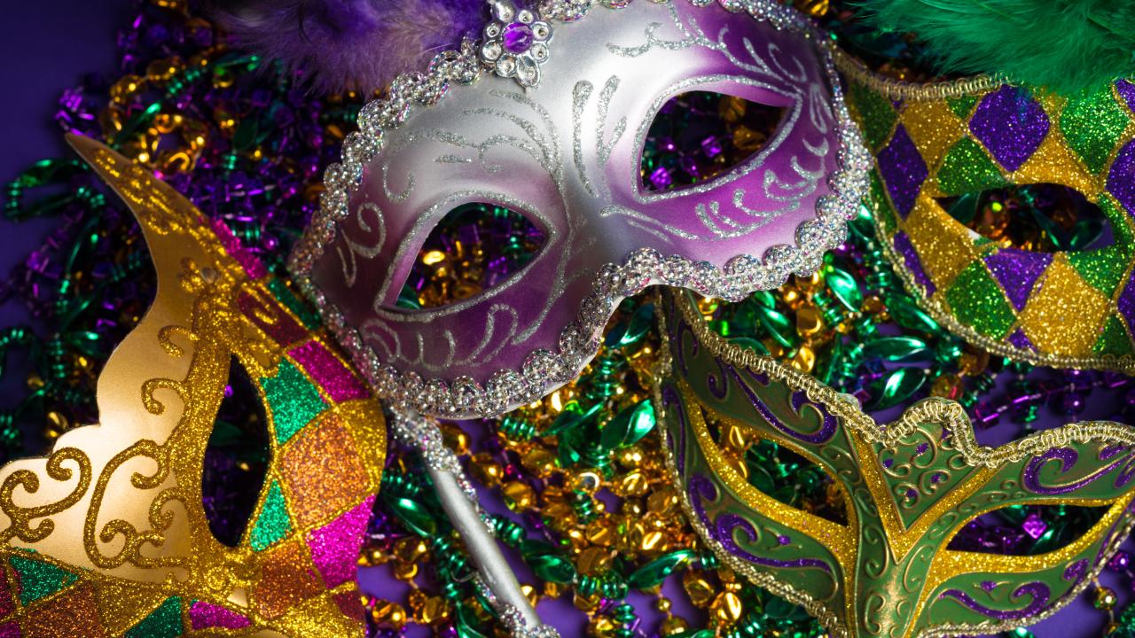 Mardi Gras-style masks and beads