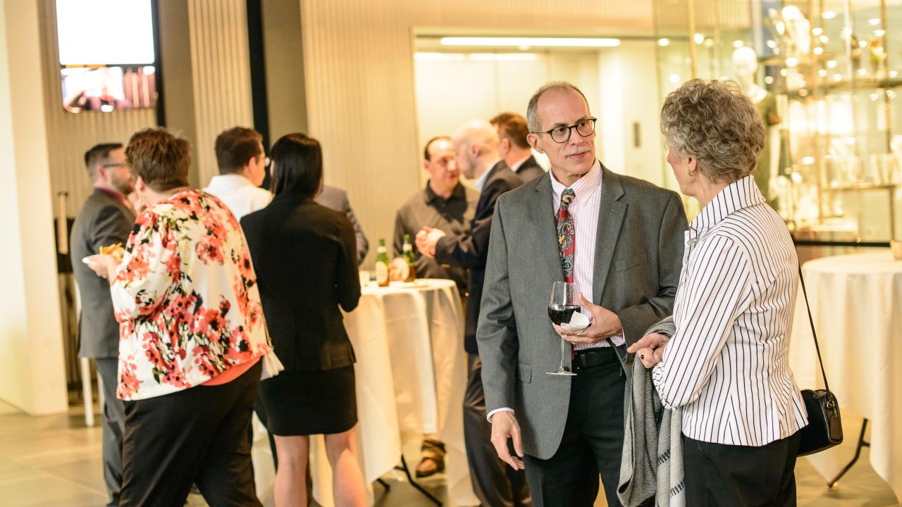 People talking during the 2018 Annual Fundraiser
