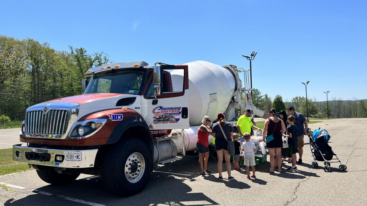 Chemung Concrete truck at an event surrounded by families