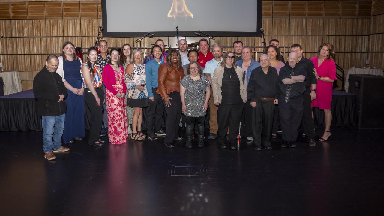 Members from Flame the Band and Wegmans standing in a group
